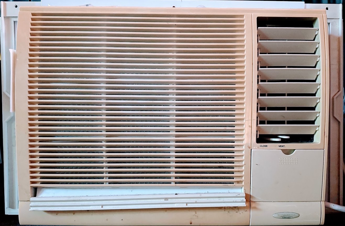 Four used white air conditioners. All working. No longer needed.