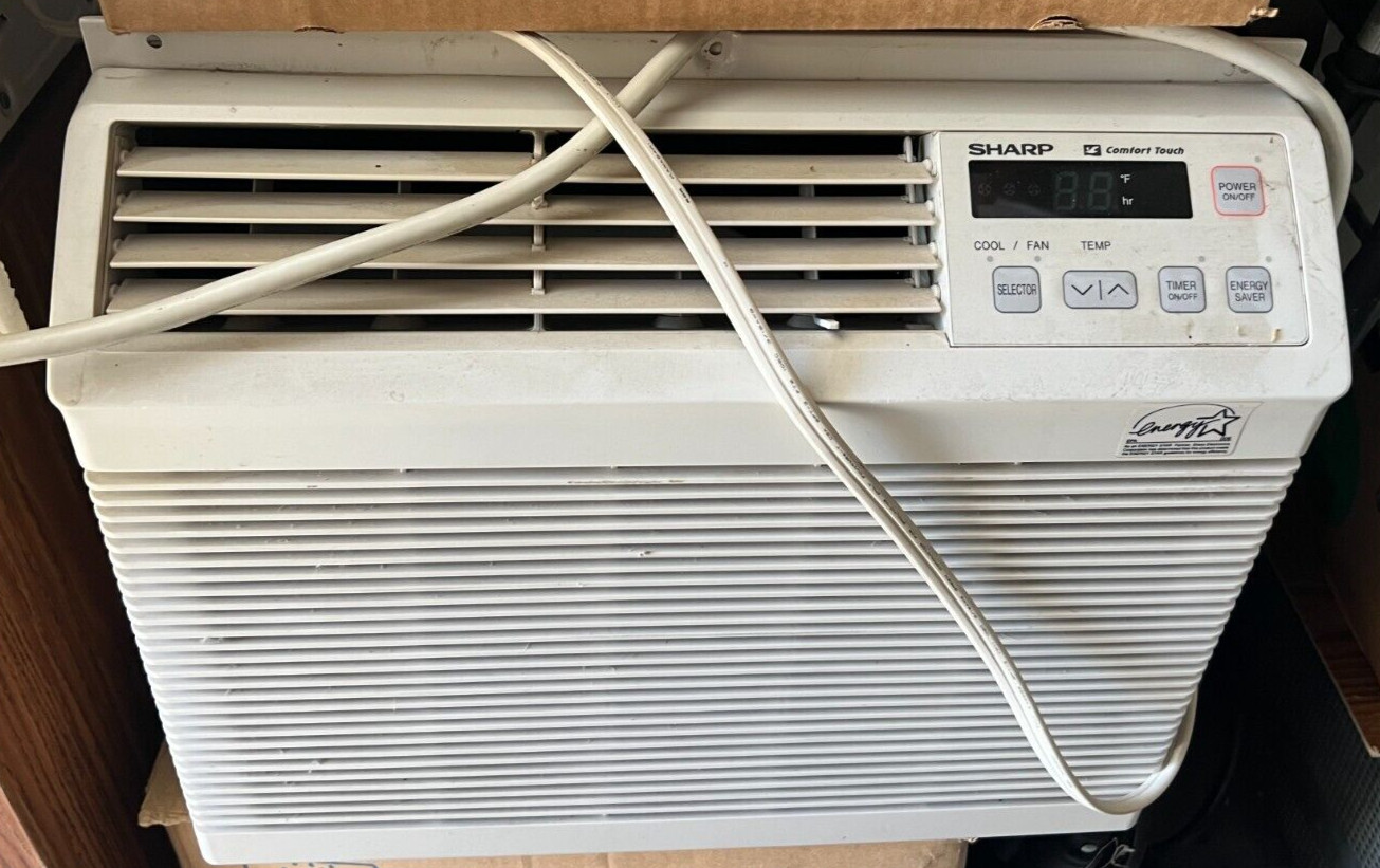 SHARP AIR CONDITIONING UNIT, WINDOW MOUNT, 5000 BTUH, USED